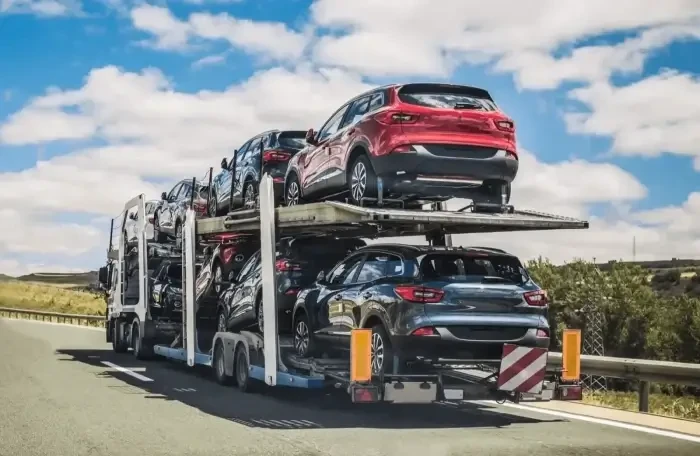  Car transporter moving on a ro