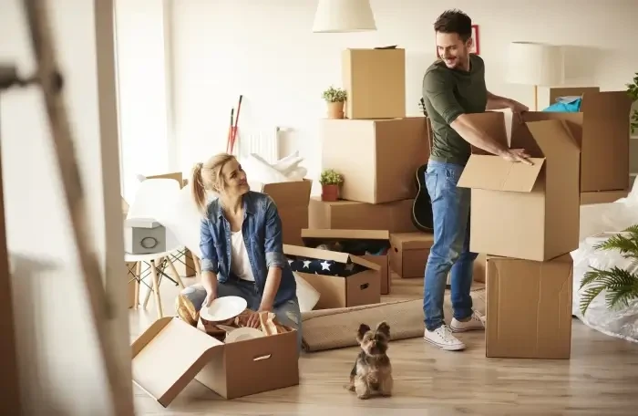  young couple new apartment with small dog 