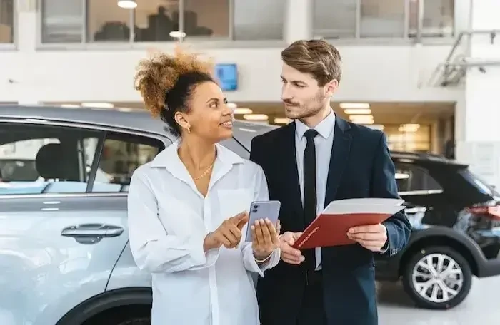  woman at car dealership small