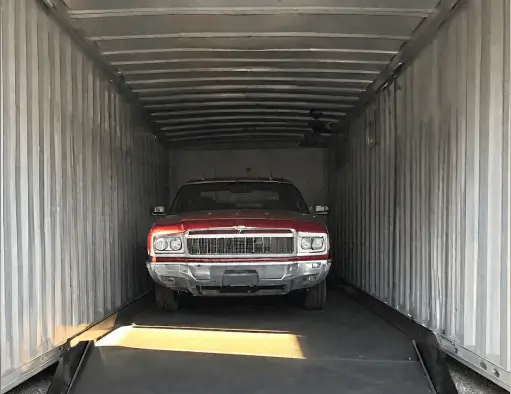 A car inside a trailer